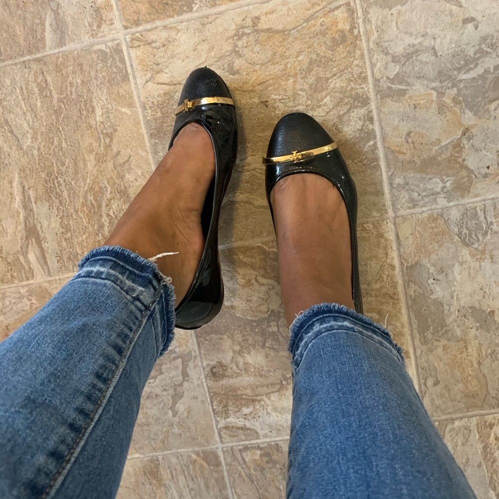 Tory Burch black flats with gold emblem